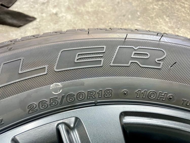 ล้อแม็ก TOYOTA FORTUNER LEADER ขอบ 18” ถอดป้ายแดง ยาง BRIDGESTONE 265-60R18 ปี 25 สีเส้นตุ่มหน้ายางยังอยู่ครบ รูปที่ 10