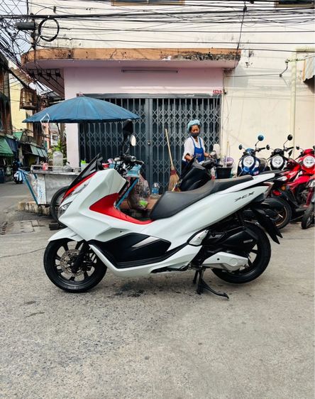 ขายรถมอเตอร์ไซค์pcx150  รูปที่ 4