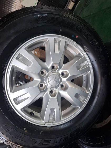 อื่นๆ 17" อื่นๆ แม็กมิตซู สีเดิม ขอบ17 พร้อมยางบริสโตน 265 65 17 ปลายปี23 ตุ่มหน้ายางยังอยู่ทุกเส้น ใส่ triton ปาเจ