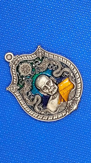 เหรียญเทพซิ่ง หลวงพ่อพัฒน์ ปุญญกาโม รูปที่ 2