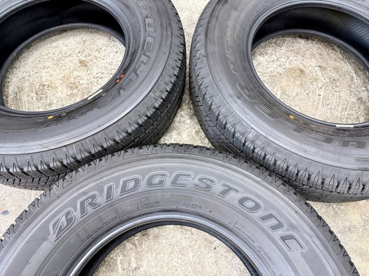 ยางถอดป้ายแดงขอบ 17” ยี่ห้อ BRIDGESTONE รุ่น DUELER HT ขนาด 255-70R17 ปี 25 สีเส้นตุ่มหน้ายางยังอยู่ครบ