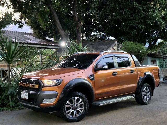 รถ Ford Ranger 2.2 Hi-Rider Wildtrak สี ส้ม