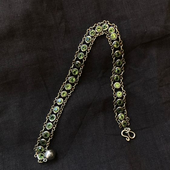 ข้อมือเงินแท้ชุบทองพลอยเขียวสวยๆคะ 