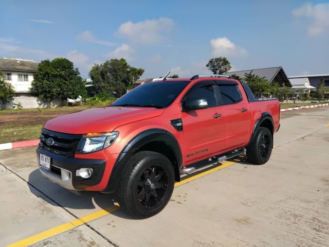 รถ Ford Ranger 2.2 Wildtrak สี ส้ม