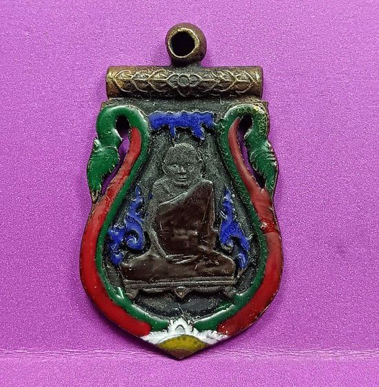 เหรียญฉลุลงยารุ่นแรกหลวงปู่เอี่ยมวัดหนังปี 2467