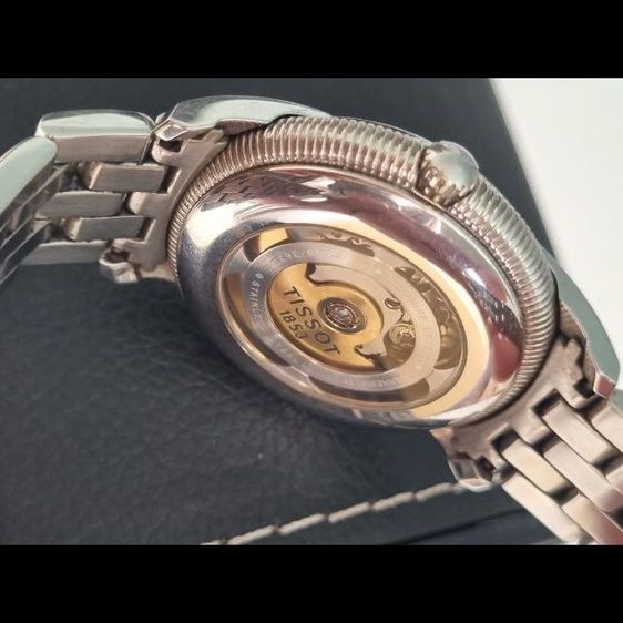 40มิล(Swiss Made)Tissot Classic ระบบออโต้สำรองพลังงาน 80 ชั่วโมง ไม่ใช้ถ่าน สภาพสวย ของจริงดูดีกว่าในรูปเยอะ รุ่นนี้ของใหม่เกือบ 30,000 บาท ขอส่งต่อ 9,500บาท ครับ รูปที่ 6