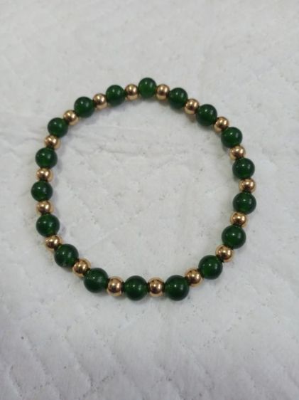 ข้อมือหยกแท้ คั่นเม็ดสีทอง (เส้นนี้เป็นงานนอกค่ะ)