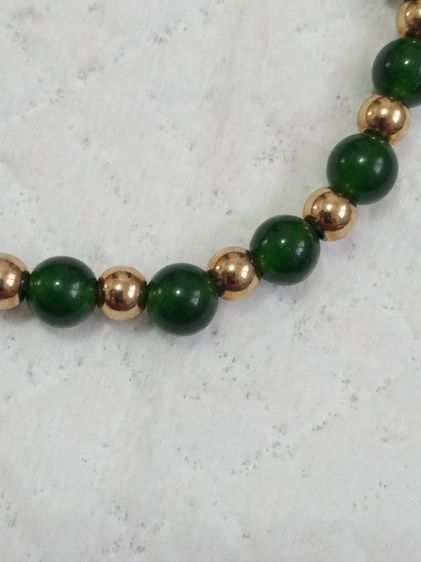 ข้อมือหยกแท้ คั่นเม็ดสีทอง (เส้นนี้เป็นงานนอกค่ะ) รูปที่ 2