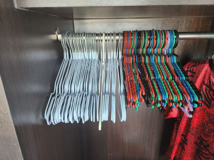 Hangers, more than half off- metal and plastic multicolored
