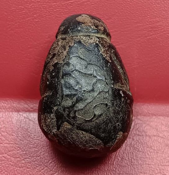 พระปิดตาพิมพ์ปั้นเนื้อผงคลุกรักหลวงปู่แก้ววัดเครือวัลย์ รูปที่ 2