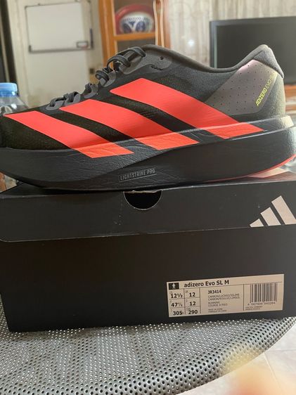 ผู้ชาย ดำ รองเท้าวิ่ง adidas evo sl