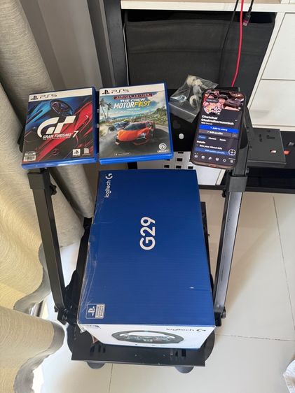 เกมส์ ขายพวงมาลัย เกียร์  Logitech G29 กับแท่นวาง  เกม  GT7 และ MOTOR FEST