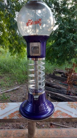 ขายโหลหมากฝรั่งสีม่วง ที่มีตั้งอยู่ตามห้าง สภาพเป็นดังรูปภาพที่เห็น รูปที่ 12