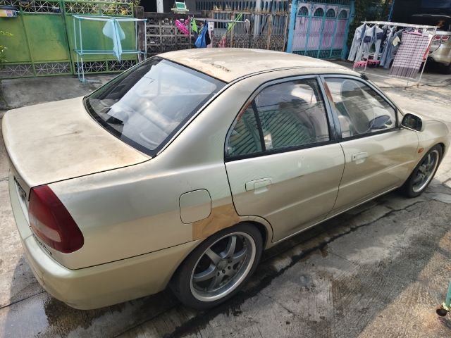 Mitsubishi Lancer 1999 1.5 GLXi LTD เบนซิน ไม่ติดแก๊ส เกียร์อัตโนมัติ บรอนซ์ทอง รูปที่ 4