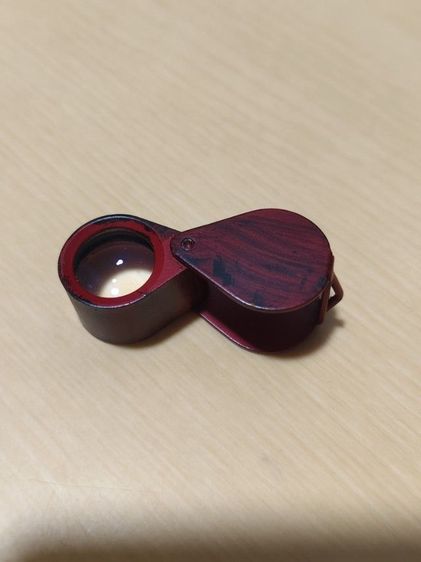 กล้องส่องพระลายไม้