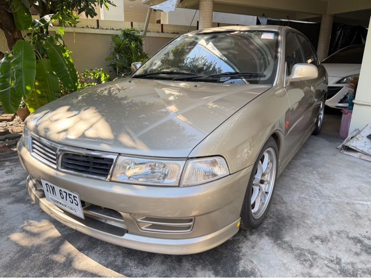 รถ Mitsubishi Lancer 1.6 GLX สี บรอนซ์ทอง
