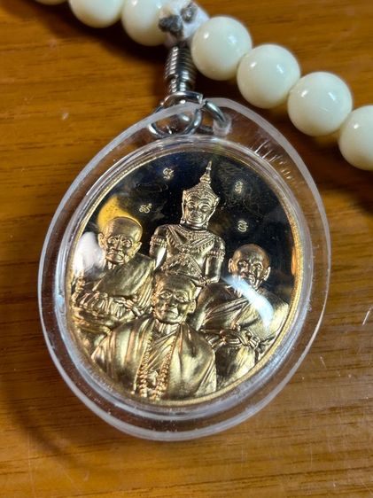 เหรียญรวมกำลังจักรพรรดิปราบไตรภพ เนื้อทองทิพย์ สร้างปี 2557 หลวงตาม้า