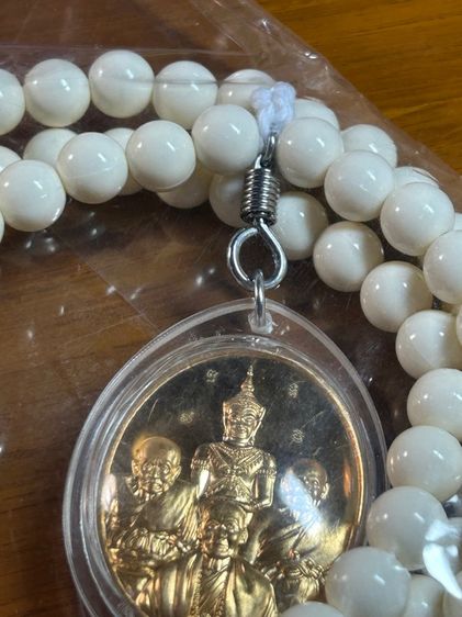 เหรียญรวมกำลังจักรพรรดิปราบไตรภพ เนื้อทองทิพย์ สร้างปี 2557 หลวงตาม้า (ใหม่ยังไม่แกะซอง) รูปที่ 8