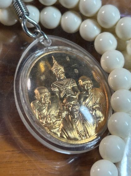 เหรียญรวมกำลังจักรพรรดิปราบไตรภพ เนื้อทองทิพย์ สร้างปี 2557 หลวงตาม้า (ใหม่ยังไม่แกะซอง) รูปที่ 9