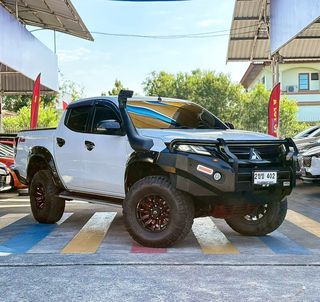 Mitsubishi Triton Plus 2.4 GLS ปี 2021 รถมือเดียว ไมล์ 7 หมื่นกว่าโลแท้ แต่งสไตล์ออฟโรดรอบคัน ตัวรถไม่เคยเฉี่ยวชน ไม่เคยแช่น้ำ