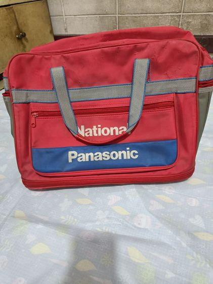 ชาย แดง กระเป๋าลาย Panasonic Multi Function