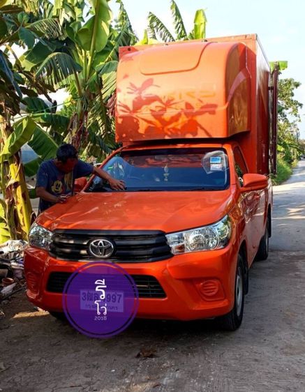รถ Toyota Hilux Revo 2.4 J สี ส้ม