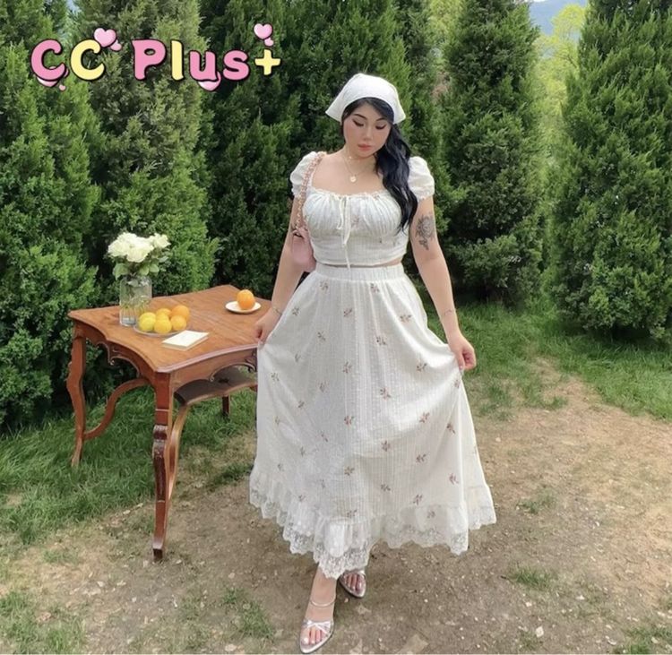 CiCi Plus Set 2 ชิ้น เสื้อครอปแขนตุ๊กตาสายด้านหน้าสามารถปรับได้พร้อมกระโปรงเอวสม๊อก สีสันน่ารักเหมาะกับสาวพลัสไซส์