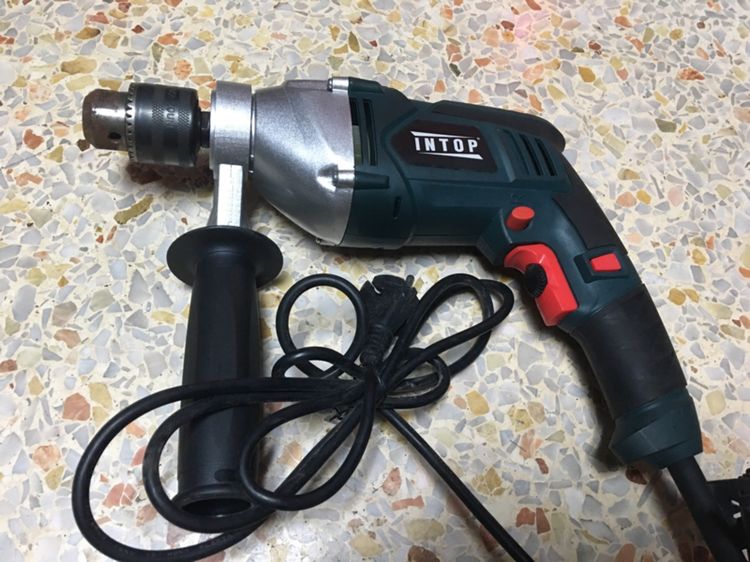 อุปกรณ์เครื่องมือช่าง สว่านไฟฟ้ากระแทกปูนได้ธรรมดาได้ปรับช้าเร็วได้  INTOP ครอบครัวที่ต้องปรับซ้ายขวาได้สภาพสวยนางฟ้าพร้อมใช้งาน