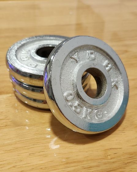 แผ่นน้ำหนัก 0.5 kg. ขนาดรู 25mm. ชิ้นละ 75 รวมค่าส่ง รูปที่ 2