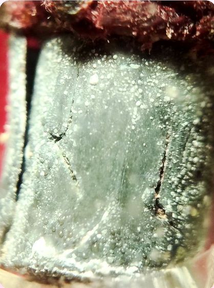 ตะกรุดหลวงปู่บญวัดกลางบางแก้ว เนื้อตะกั่วนํานม ไขขึ้นเป็นเม็ด เป็นเม็ดสีาว รูปที่ 6