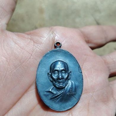 เหรียญหน้าแก่ หลวงปู่สี ฉนฺทสิริ วัดเขาถ้ำบุญนาค รุ่นสร้างปี พ.ศ. 2519