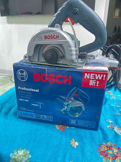 BOSCHGDC140เป็นเครื่องตัดหินอ่อนกระเบื้องแบบใช้มือถือขนาด4นิ้วสภาพ90 รูปที่ 3