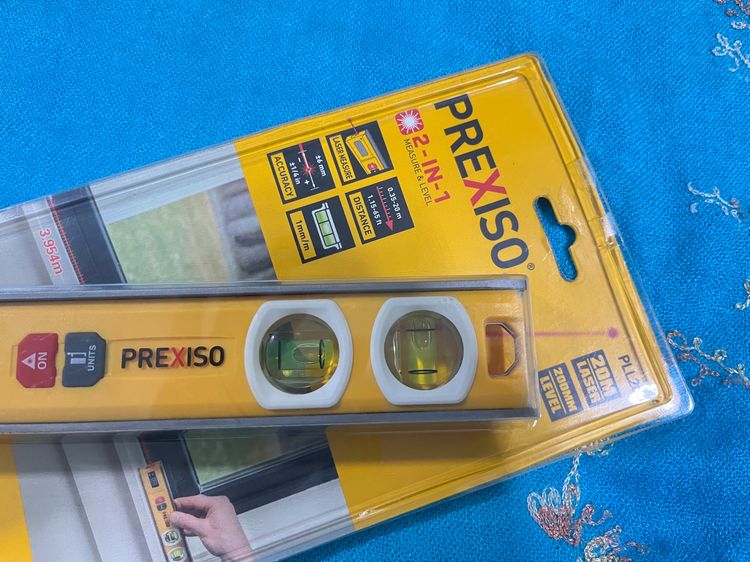 Prexiso PLL20 เป็นเครื่องมือวัดที่ผสมผสานระหว่างเครื่องวัดระยะด้วยเลเซอร์และระดับน้ำตอร์ปิโด (torpedo level) แบบ 2-in-1 รูปที่ 7