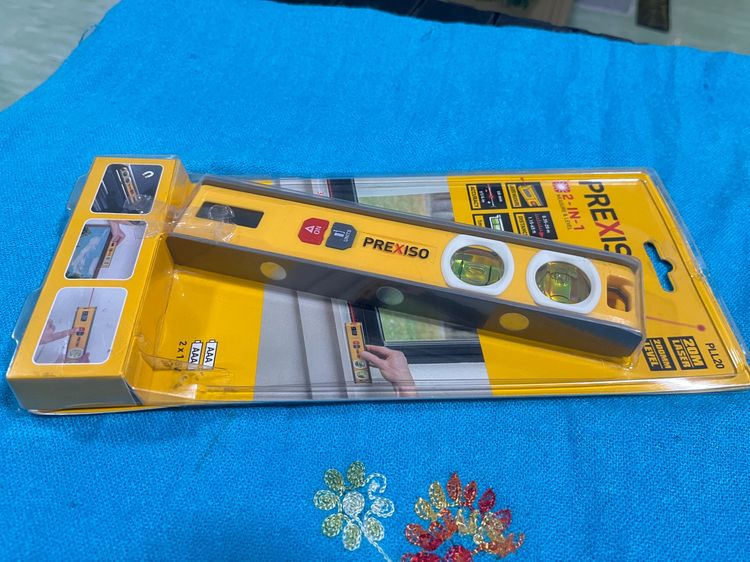 Prexiso PLL20 เป็นเครื่องมือวัดที่ผสมผสานระหว่างเครื่องวัดระยะด้วยเลเซอร์และระดับน้ำตอร์ปิโด (torpedo level) แบบ 2-in-1 รูปที่ 3