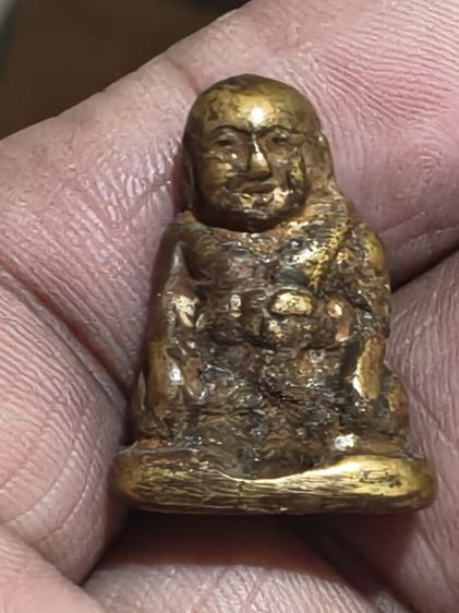 พระเครื่องเมืองสุโขทัยรูปหล่อโบราณหลวงพ่อเอมวัดคลองโป่งเนื้อทองผสม