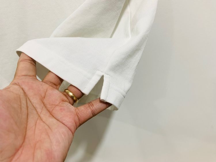 เสื้อโปโล UNIQLO แท้ 💯 size L ขนาด อก 21 ยาว 27 นิ้ว สภาพดีมาก สีขาวจั๊ว ดีเทลสวย เนื้อผ้าดีมากนิ่มใส่สบาย หายากน่าสะสมครับ รูปที่ 3