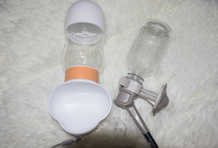 กระบอกน้ำสัตว์เลี้ยงแบบพกพา 2IN1 + จุกน้ำพร้อมขวดน้ำอย่างดี น้ำไม่รั่ว จุกลูกกลิ้งสแตนเลสพร้อมขวด สำหรับสุนัขและแมว รูปที่ 2