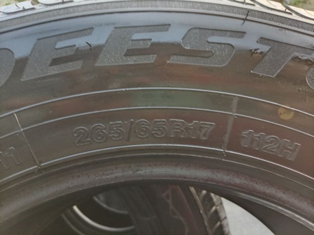 ยางป้ายแดงดีสโตน 265 65 17 ปลายปี 25