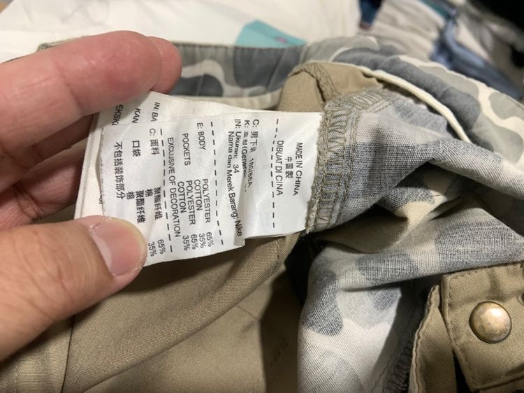 กางเกง NIKE แท้ 💯 size XL วัดจริงเอว 32-36 ใส่ได้ มีสายปรับขนาด ยาว 40 ปลายขา 7.2 นิ้ว สภาพดีมาก ทรงสวย ตัดเย็บดีมาก หายากน่าสะสมครับ รูปที่ 10