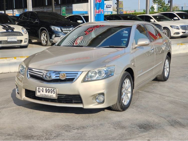 รถ Toyota Camry 2.4 Hybrid สี บรอนซ์ทอง