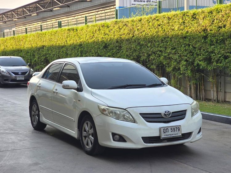 Toyota Altis 2010 1.6 E CNG Sedan เบนซิน NGV เกียร์อัตโนมัติ ขาว รูปที่ 3