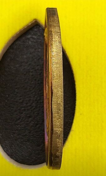 เหรียญยืนพระพุทธเจ้าสิบชาติ รุ่นแรก เนื้อนวะ รูปที่ 4