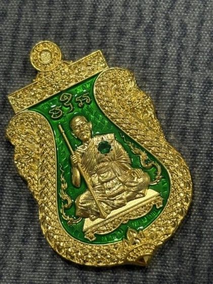 เหรียญเสมาพญาเสืออุดมทรัพย์ พระอาจารย์ประสูติ (หลวงพ่อประสูติ) วัดในเตา ตรัง เนื้อชุบทอง ลงยาเขียว ฝังพลอยเขียวสังฆาฏิ 1 เม็ด หมายเลข 75 พร้อมกล่องเดิม

 รูปที่ 4