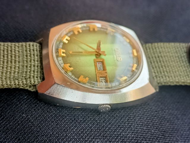Vintage Oris Automatic 25 Jew.Anti-Shock 1973'sทรงถังเบียร์ หน้าเดิมเหลือบเขียว เครื่องใส เดินปรกติ ขนาด37x42mm. ก.ส.สวยพร้อมสายเขียวทหาร รูปที่ 6