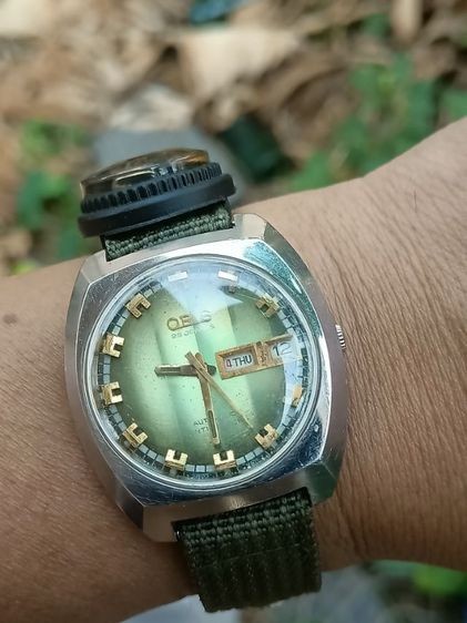 Vintage Oris Automatic 25 Jew.Anti-Shock 1973'sทรงถังเบียร์ หน้าเดิมเหลือบเขียว เครื่องใส เดินปรกติ ขนาด37x42mm. ก.ส.สวยพร้อมสายเขียวทหาร รูปที่ 4