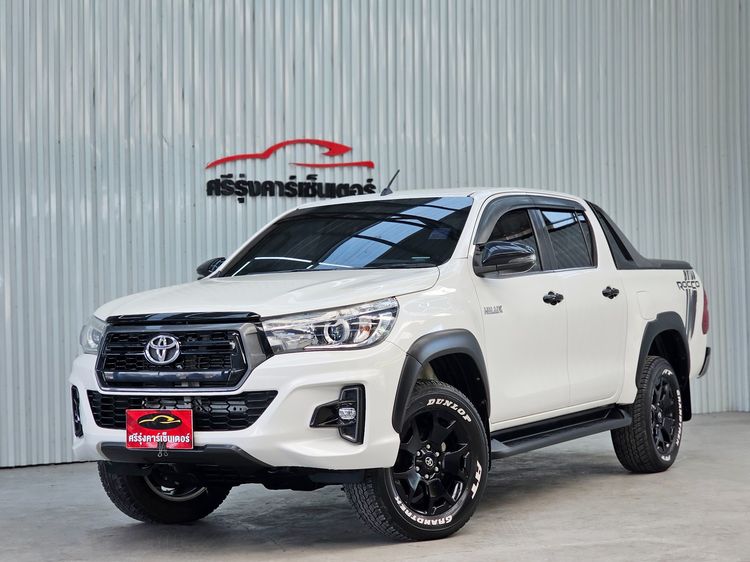 รถ Toyota Hilux Revo Double Cab Prerunner 2x4 2.4 Rocco สี ขาว