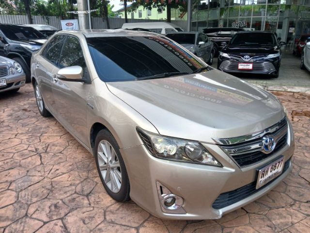 รถ Toyota Camry 2.5 HV สี บรอนซ์ทอง