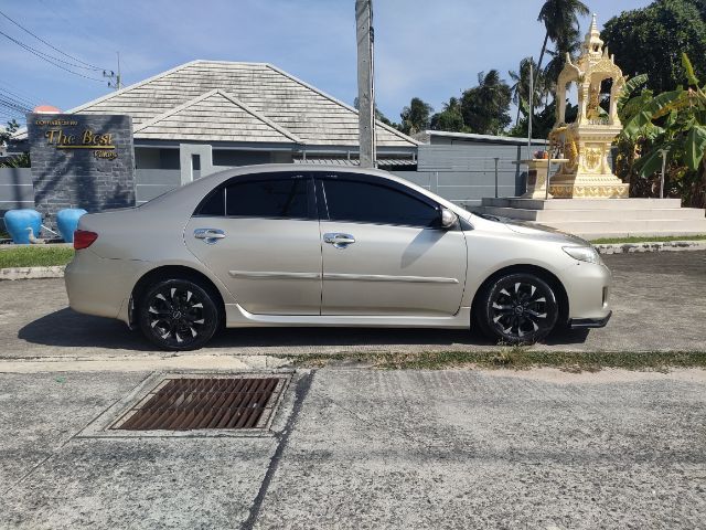 รถ Toyota Altis 1.6 E CNG สี บรอนซ์ทอง