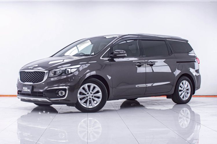 รถ Kia Carnival 2.2 EX สี น้ำตาล