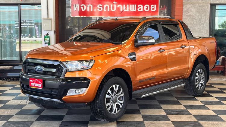 รถ Ford Ranger 2.2 Hi-Rider Wildtrak สี ส้ม